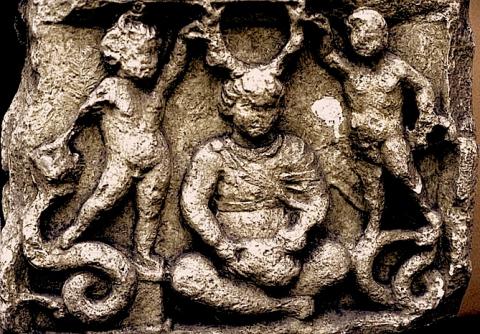 Cernunus with putti & serpents. Gallo-Roman: Stone. Vendoeuvres, Indres. France.